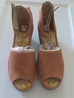 Suede upper with wedge heel